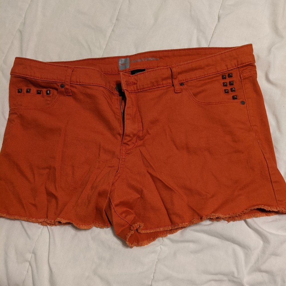 Orange studded shorts